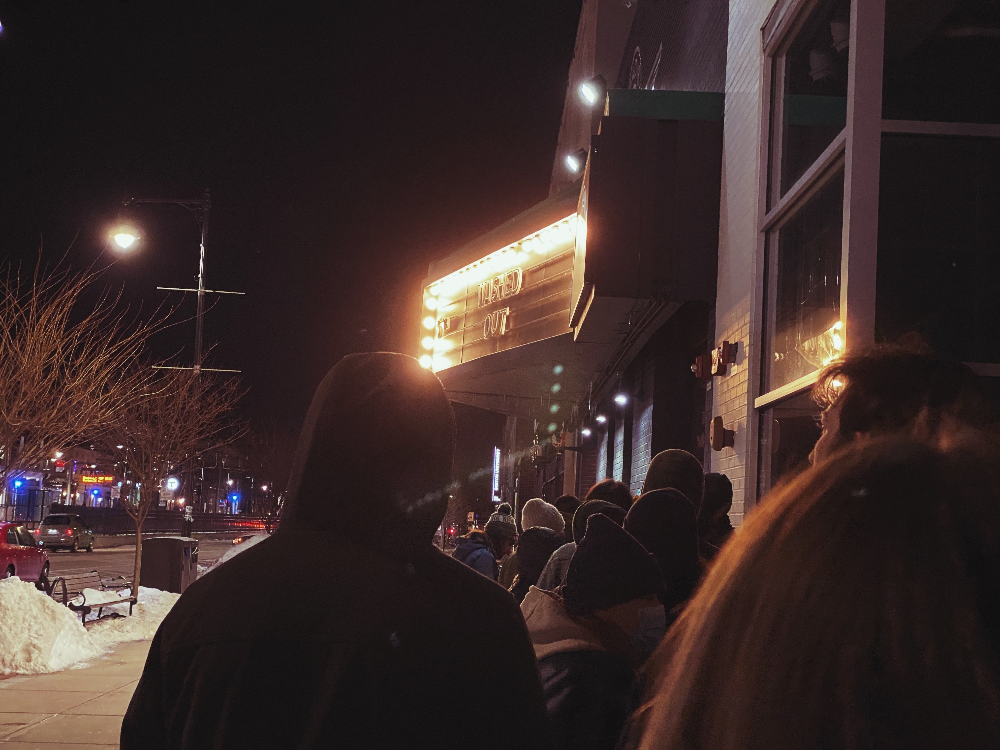 Concert goers in Boston wait in line outside Paradise Rock Club for Washed Out show